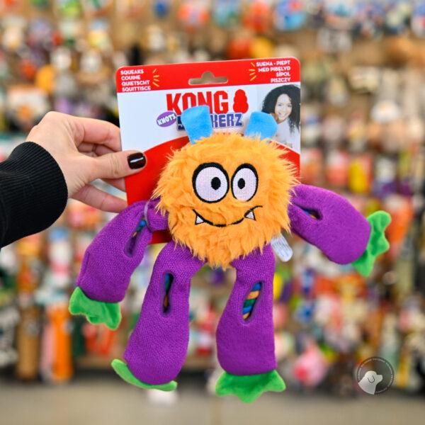 KONG Sneakerz Knots M - zabawka ze sznurem - pomarańczowo fioletowy